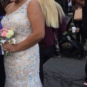 Off the shoulder dress on the left side.